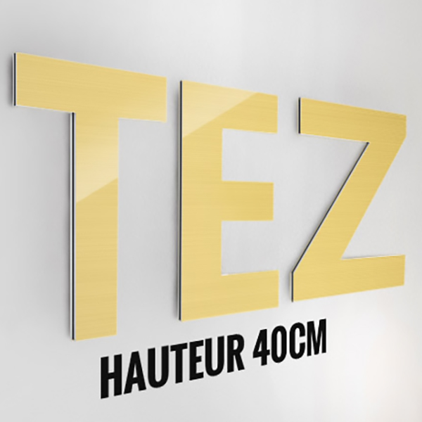 Lettre ou logo découpé en alu brossé or 3 mm , format H 40 x  Largeur 80 cm 