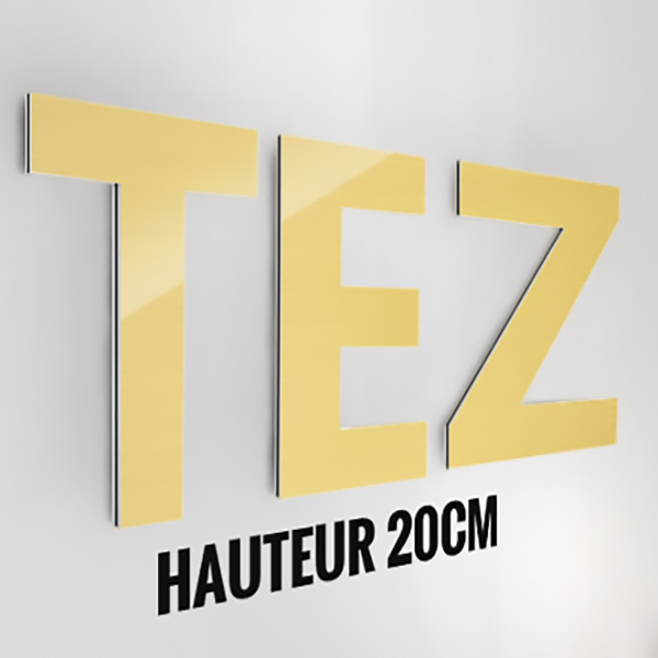 Lettre ou logo découpé en alu brossé or 3 mm , format H 20 x  Largeur 180 cm 